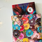 a small book peeking out the donut book protector