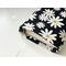 the inside of the padded book pouch matches the outside of the floral book cover