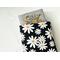 a medium size book peeking out of the daisy book jacket