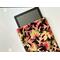 a tablet peeking out of the autumn tablet cover