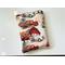 this fall book sleeve has a light brown background with farmhouse, truck filled with pumpkins and fall trees