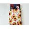 a small book is peeking out of the sunflower book holder