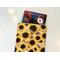 a small book peeking out of the flower book pocket