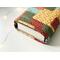 the inside of the padded book pouch matches the outside of quilted book cover