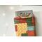 a medium size book peeking out of the fall book holder