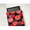 a tablet peeking out of the Halloween tablet cover