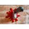 wooden wall-mount knife hook set hanging on wood wall with red blood splatter