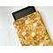 a tablet is peeking out of the floral tablet protection