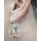 Pumpkin wire earrings handmade and worn by Cyndi Jones