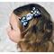 My year old modeling the Black glitter with bright neon cheetah print on top. Topped w/ neon candy resin charm.