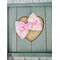 Textured floral inspired Soft pink, peach, blue, & yellow, hair bow, with Pink sparkle shell charm on top. Bow is approx. 4 x 3. 