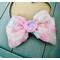 Textured floral inspired soft pink, peach, blue, & yellow, hair bow, with pink sparkle shell charm on top. Bow is sold individually. 