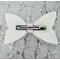 Back view of white glitter bow with pink & white ghost design, with very light pink lace ribbon. Bow is approx. 5 x 2 1/2.
