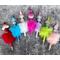 7 beaded rainbow inspired faux fur pens. Left to right: Red, blue, white, hot pink, lilac, green, and peach. Pens sold individually. 