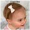 My 13 month old modeling a 2" size ribbon bow. This bow is a number bow and can be purchased on another listing. Just for size reference. 