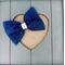 Navy blue 4 x 3 glitter tulle hair bow. Brought together with a piece of white glitter faux leather.  Bow is sold individually.