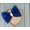 Navy blue 4 x 3 glitter tulle hair bow. Brought together with a piece of white glitter faux leather.  Bow is sold individually.