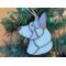 German Shepherd Ornament in White, hanging in a Christmas Tree.