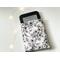 an ebook peeking out of the floral ebook covers