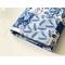 the inside of the padded book pouch matches the outside of the patchwork book cover