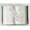 purple page holder on top of an open book