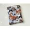 this cat book sleeve is covered in cats