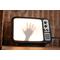 front view of hanging wall-mount Retro TV LED Lightbox Sign with creepy hand for Horror Movie Fans, Gamers, Bedroom Decor - light wall art 