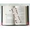 cute bookish bookmark has a light brown background with brown outlines of floral and books all over the bookish page saver
