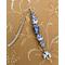 This is also one of my favorite bookmarks.  The white ceramic beads with royal blue flowers is stunning.  This has the lightweight shepherd hook but also has a larger bead directly in the middle of bead with a theme to it. Charm is at bottom.