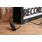 light switch on black wood recording studio LED lightbox and lamp sitting on desk for home studio, podcasters, musicians, and gamers