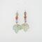 Super cute autumn earrings. Celebrate fall with these sweet dangles which have three teeny tiny copper enamel pumpkins of pastel green, orange, and lavender, with a pale green leaf swinging below. Super lightweight. Photo shows a dime for size reference.