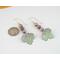 Super cute autumn earrings. Celebrate fall with these sweet dangles which have three teeny tiny copper enamel pumpkins of pastel green, orange, and lavender, with a pale green leaf swinging below. Super lightweight. Photo shows a dime for size reference.