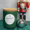 12 ounce soy wax candle called Kiss Under the Mistletoe with a crackling woodwick.  Hand poured with love in Parker Colorado.
