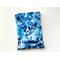 this tie dye book sleeve is blue tie dye.