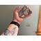 French Bulldog Ornament- Gray- being held for size reference.