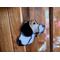 Beagle ornament hanging on a wall.