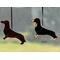 Dachshund Ornaments in direct sunlight.