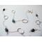 Long 35 inch sterling silver and labradorite necklace with hand made silver circle links and faceted labradorite nuggets.
