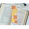 this fall patchwork bookmark has blocks of yellow, orange white blocks. Each block has a different pattern. Either fall leaves or fall flowers