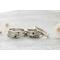 Free formed organic shaped sterling silver ring stamped with name and hearts.