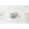 Free formed organic shaped sterling silver ring stamped with name and hearts.