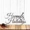 Happy Holidays metal wall art with Christmas tree, in raw steel.