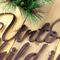 Close up of copper vein powder coat on our Unto Us A Child Is Born metal sign.