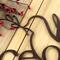 Close up of copper vein powder coat on our Peace on Earth metal wall art.