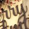 Close up of copper vein powder coat on our Merry Christmas metal sign.