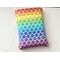 this mermaid scale book sleeve is rainbow with scales all over the book holder.