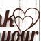 Close up of hearts on our Think with your Heart metal sign, in copper vein powder coat.