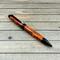 amber looking pen