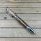 Dark wood pen