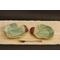 Bride & Groom's Table ceramic heart shaped dinner plate set with Hosta plant texture. Glazed in teal with maroon on adjacent edges. 8"x9"